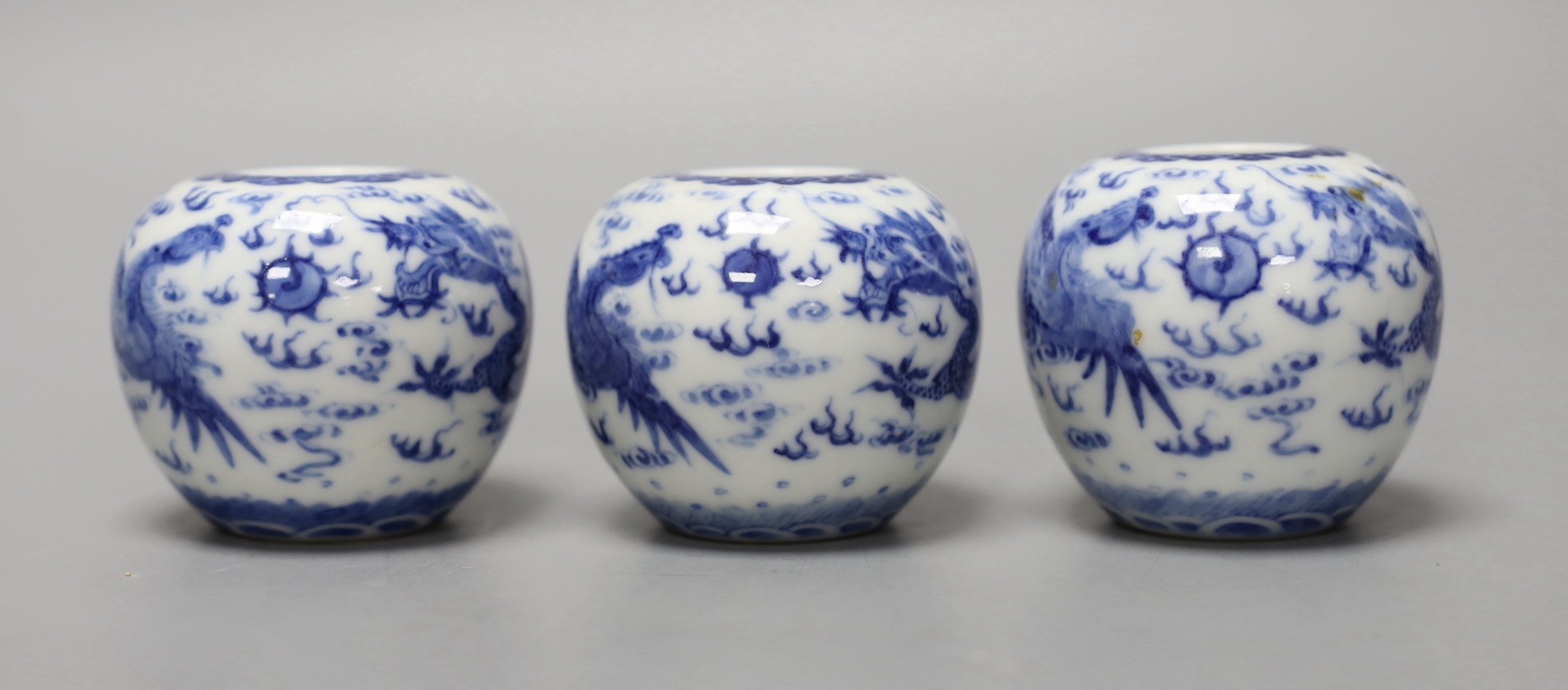 Three Chinese blue and white 'dragon and phoenix' waterpots, probably Republic period, 6cm